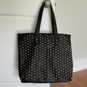 Black and gold studded bag